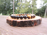 Obsidian and Tiger Eye for Negative Energy Protection by Rock My Zen